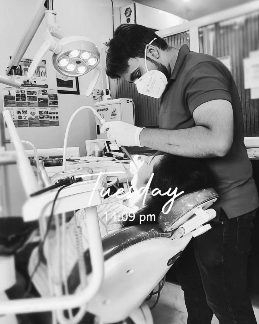 Dr. Utkarsh Rathore at the instrument cabinet in the treatment room